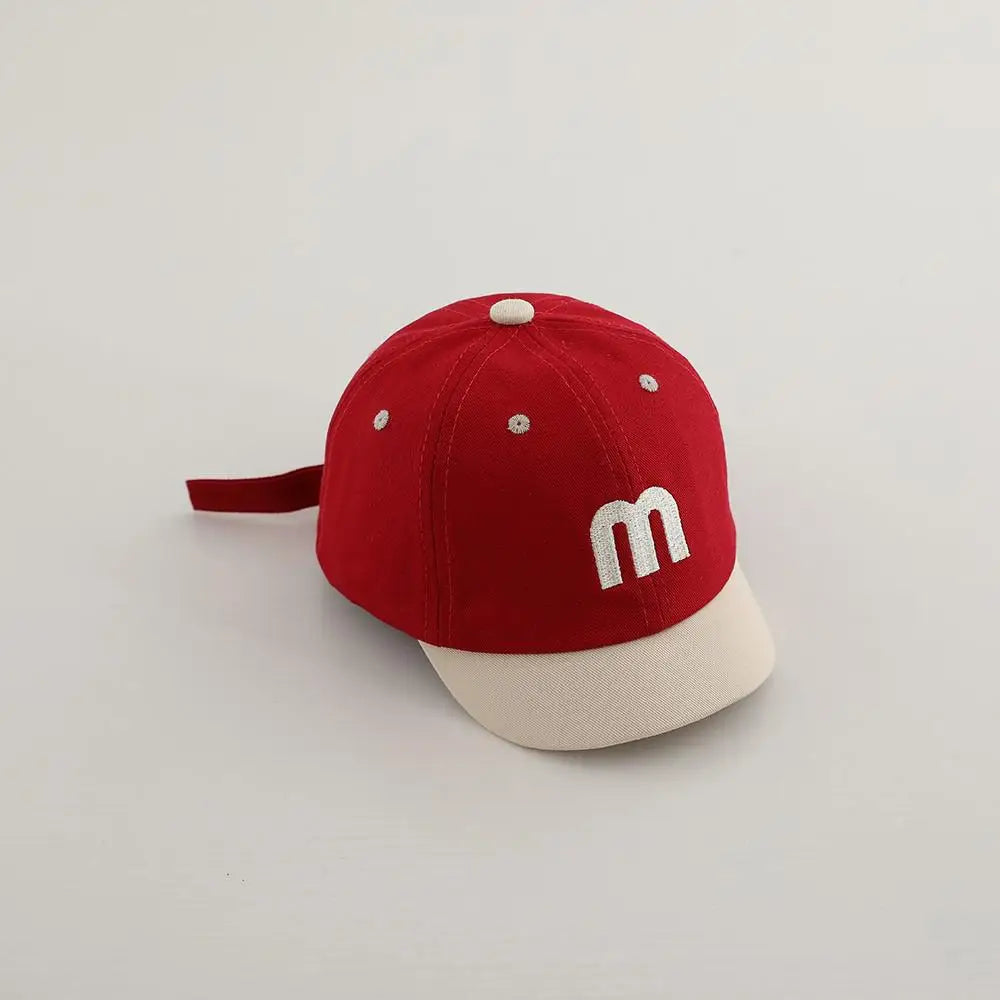 Letter M Peaked Cap