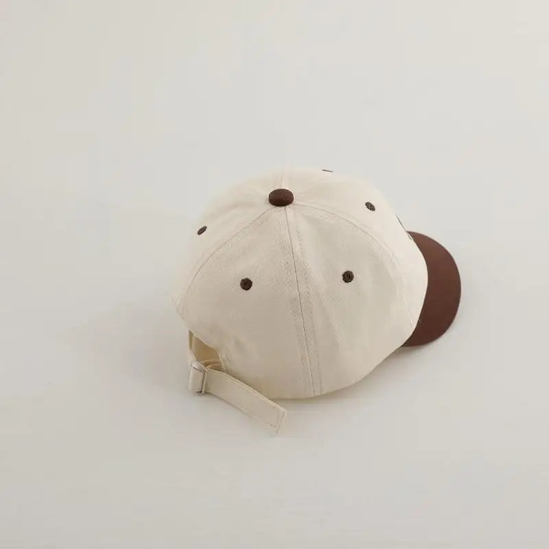 Letter M Peaked Cap